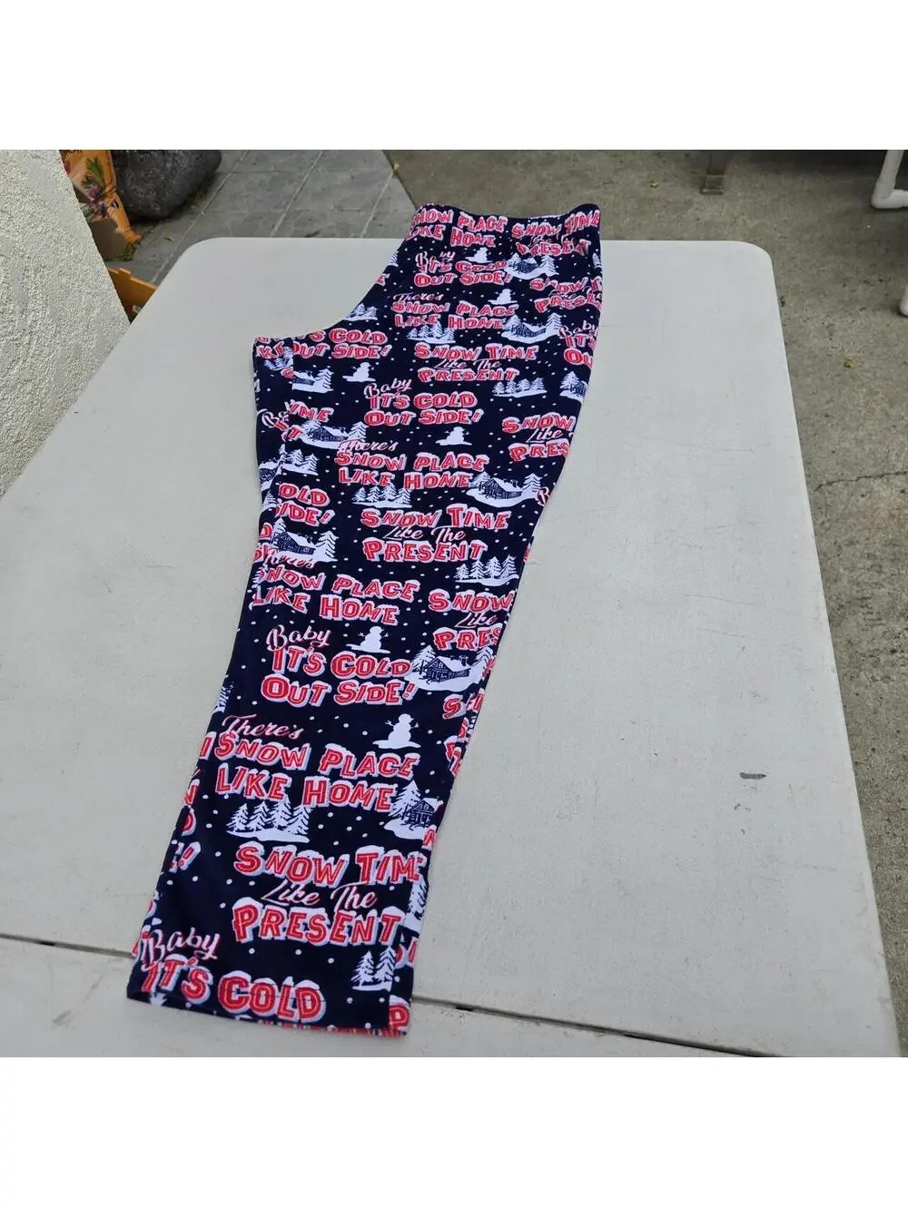 -Navy blue and red Christmas snow pants
